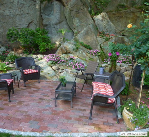 brick patio with cobblestone edging